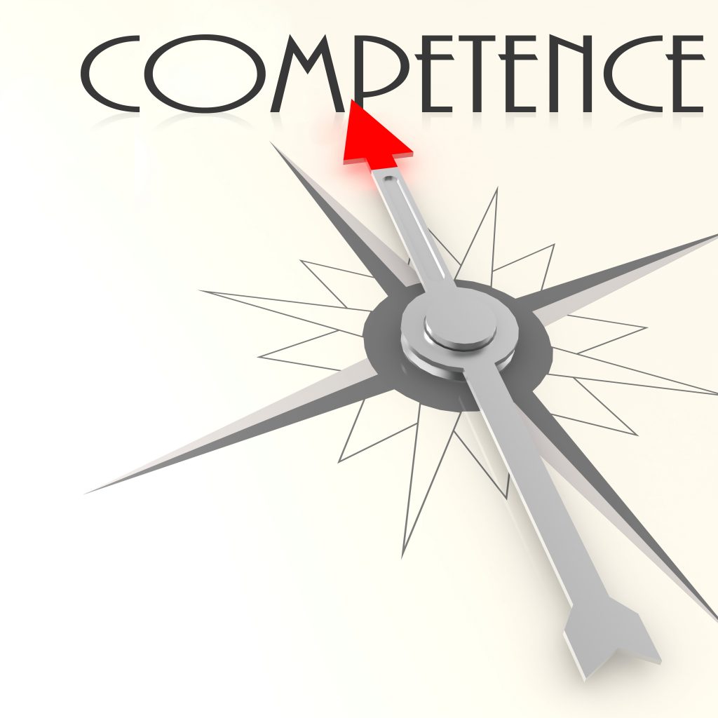 Kompassnadel, die auf das Wort "competence" zeigt